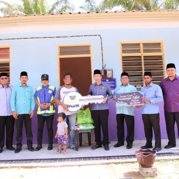 Penyerahan bantuan rumah